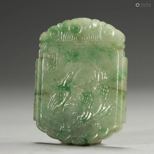 A MAGNIFICENT CARVED EMERALD PLAQUE