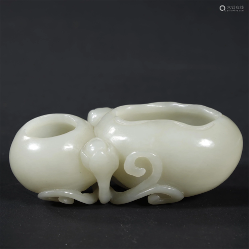 A MAGNIFICENT CARVED WHITE JADE WATER …