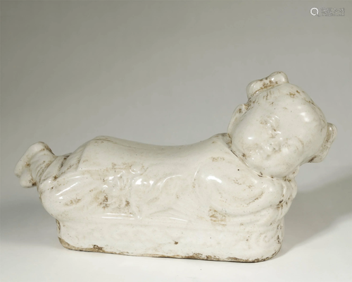 AN ARCHAIC WHITE-GLAZED PILLOW