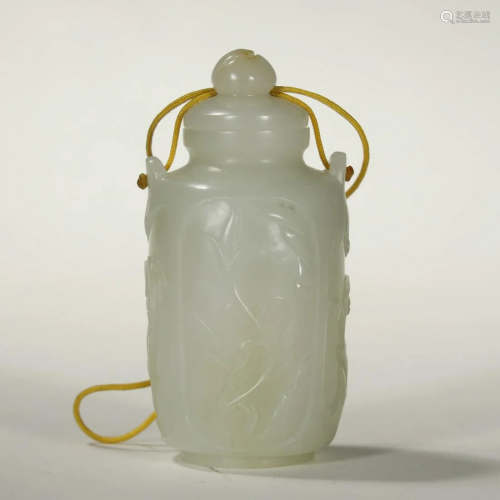 A RARE CARVED WITH WHITE JADE SNUFF BOTTLE