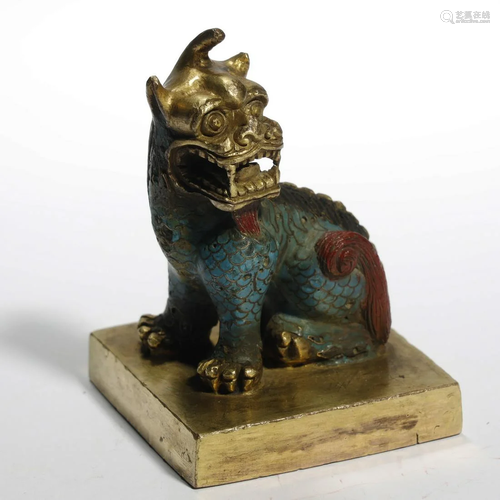 AN ARCHAIC GILT-BRONZE CLOISONNÃ‰ EN…