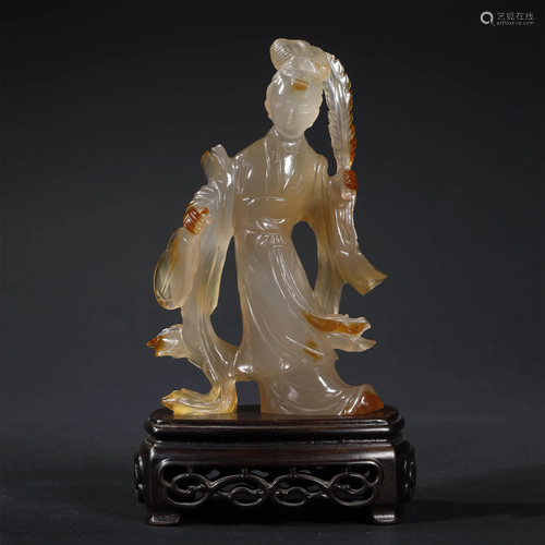 A MAGNIFICENT CARVED AGATE MAID