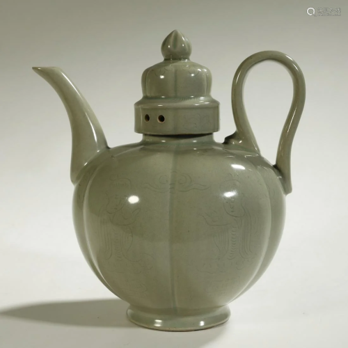 AN ARCHAIC CELADON-GLAZED EWER