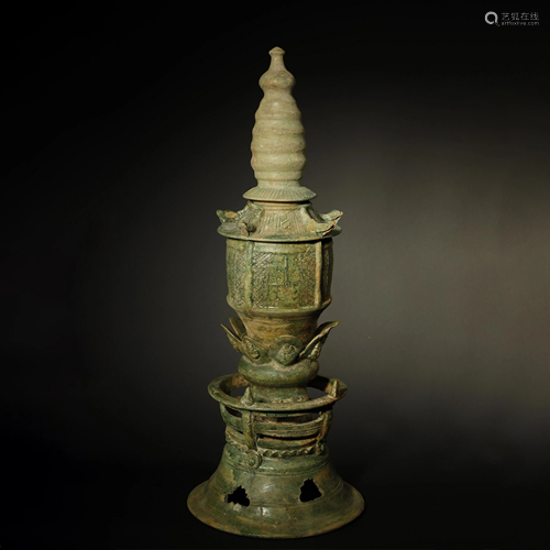 A LARGE GREEN-GLAZED POTTERY BUDDHIST P…