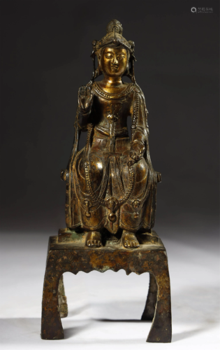 AN ANTIQUE GILT-BRONZE BUDDHA