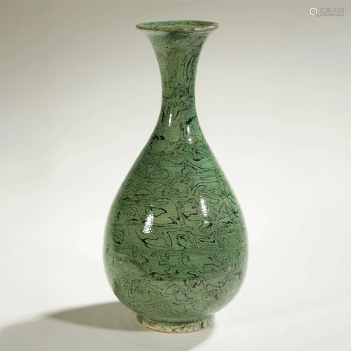 A RARE AND IMPORTANT GREEN-GLAZED Y…