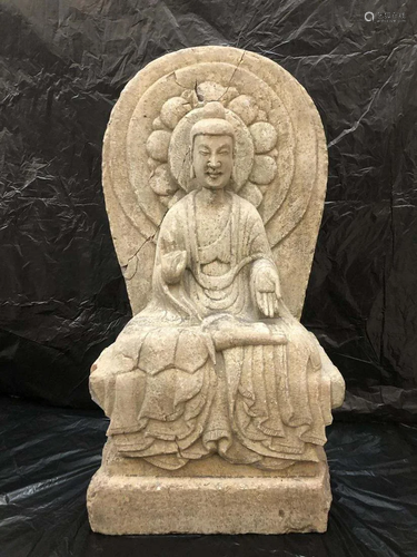 A CHINESE CARVED STONE SEATED BUDDHA, NO…