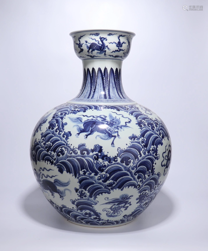 A CHINESE BLUE AND WHITE MYTHICAL BEAST VASE…