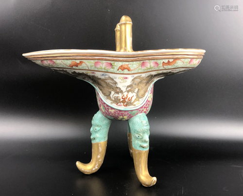 A CHINESE FAMILLE ROSE TRIPOD CUP WITH XIA…