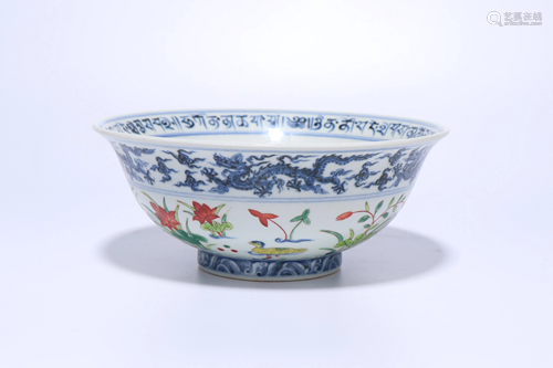 A CHINESE BLUE AND WHITE OVERGLAZED DOUCAI…