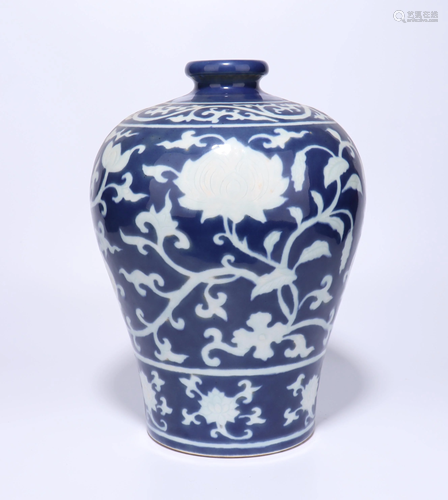 A CHINESE BLUE GLAZED WHITE LOTUS VASE, …