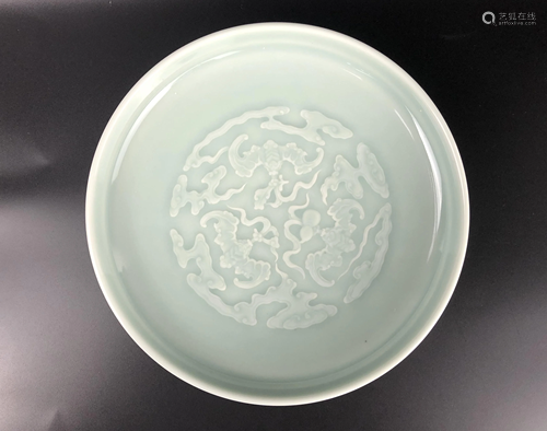 A CHINESE LIGHT GREEN GLAZED DISH WITH …