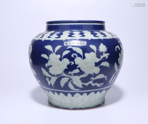 A CHINESE BLUE GLAZED CARVING WHITE FL…