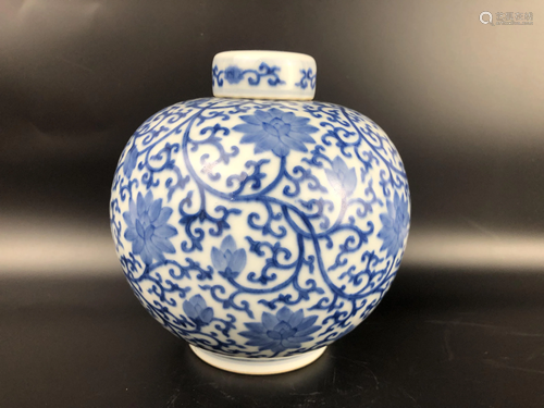 A CHINESE BLUE AND WHITE FLOWER JAR, QING D…