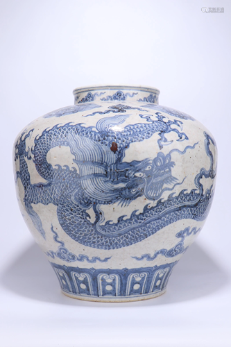 A CHINESE BLUE AND WHITE DRAGON JAR, MING …