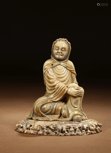 A CHINESE SOAPSTONE FIGURE OF SEATED LUOHAN, …