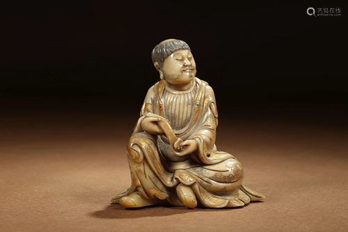 A CHINESE SOAPSTONE FIGURE OF SEATED LUOHAN, …