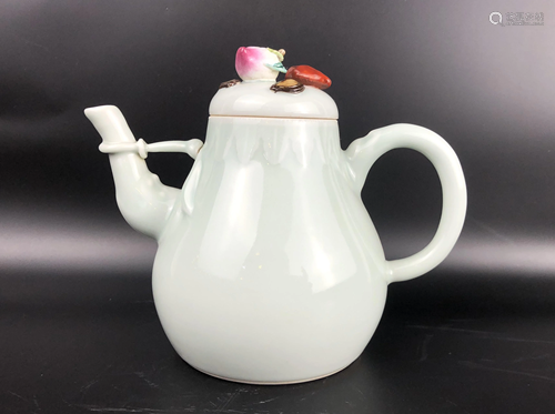 A CHINESE LIGHT GREEN GLAZED TEA POT, QI…