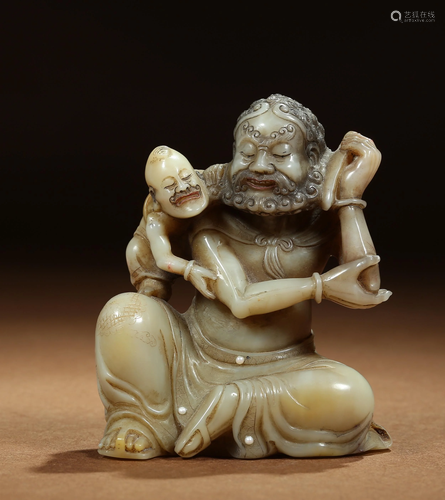 A CHINESE SOAPSTONE FIGURE OF SEATED LUOHAN, …