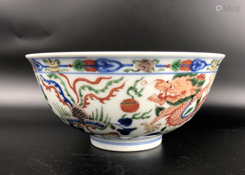 A CHINESE FAMILLE VERTE BOWL, WITH KANGXI …