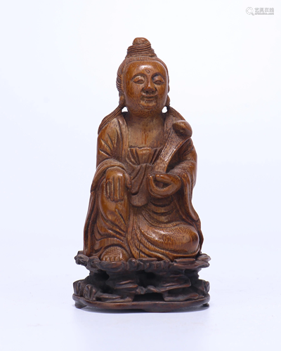 A CHINESE BAMBOO FIGURE OD SEATED GUANYIN…