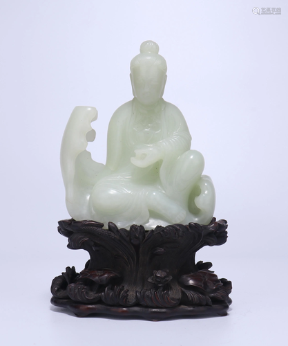 A CHINESE FINE WHITE FIGURE OF SEATED GUANYIN…