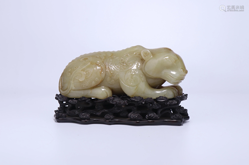 A CHINESE FINE WHITE JADE MYTHICAL BEAST SCULP…