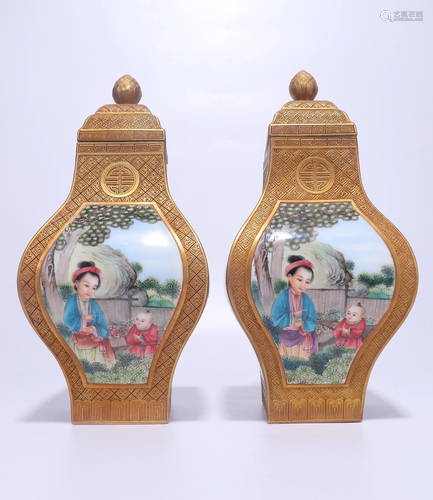 A PAIR OF CHINESE GILT FAMILLE ROSE VASES AN…