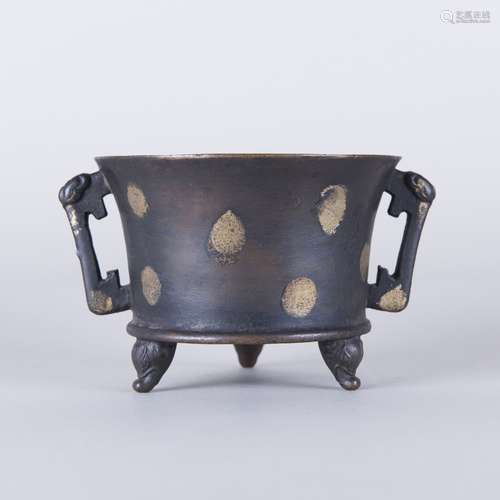 A GILT-SPLASHED BRONZE TWO-HANDLED TRIPOD CENSER, 18TH CENTURY