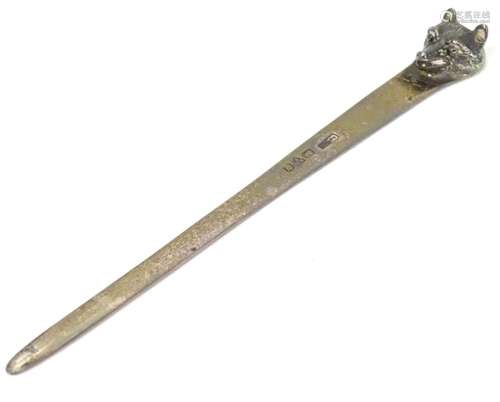 A silver letter opener with fox head decoration. Hallmarked Chester 1924 maker Asprey & Co Ltd. 5