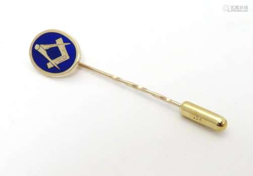 Masonic Interest : A 9ct gold stick pin surmounted by blue enamel oval decoration with masonic