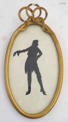 A 19thC silhouette depicting a full length portrait of a Georgian gentleman. Approx. 8 1/2