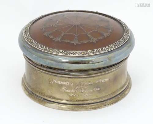 A silver dressing table pot of ring box form with tortoiseshell and piquet work detail to lid.