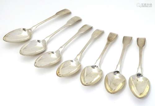 A set of 7 Geo III silver fiddle pattern dessert spoons hallmarked London 1798 maker George Smith