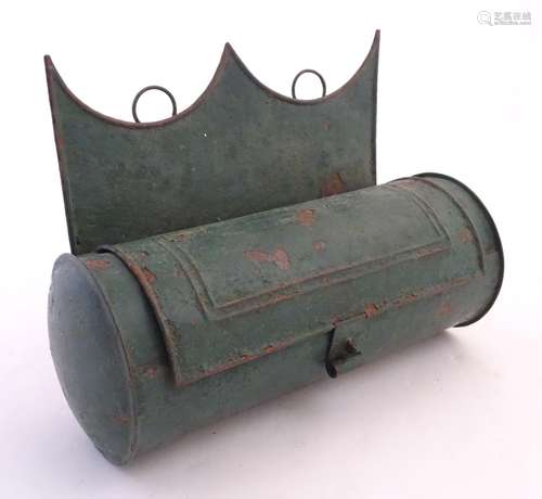 A 19thC cylindrical tin wall hanging candle box with tole peinte decoration. Approx. 8 1/4