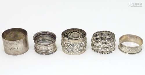 5 assorted late 19thC / early 20thC silver napkin rings. (100g) Please Note - we do not make