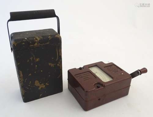 A mid-20thC volt meter by Evershed & Vignoles, London, the 'Megger', in bakelite case with