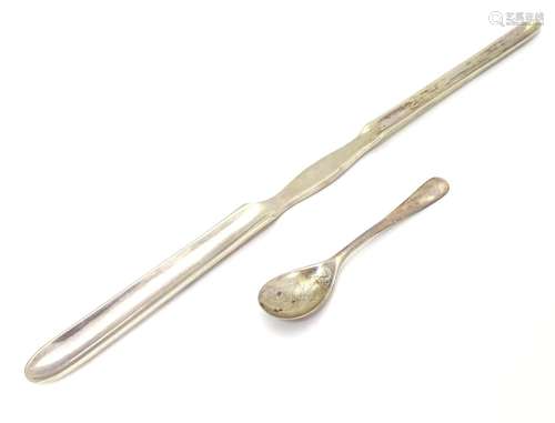 A silver mustard spoon hallmarked Sheffield 1904 maker Henry Williamson Ltd, together with a