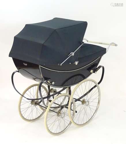 A mid-20thC Marmet coach-built perambulator/pram in navy blue, 53