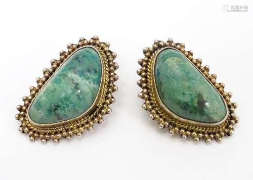 A pair of Israeli silver gilt clip earrings set with malachite hardstone. Approx 1