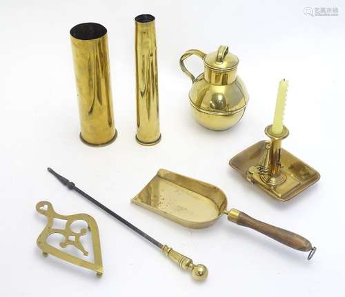 A quantity of assorted brassware, to include a chamber stick, lamp, trivet, First & Second World War