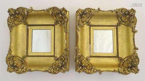 A pair of 19thC gilt mirrors, the frames cornered with acanthus scroll and shell and pearl