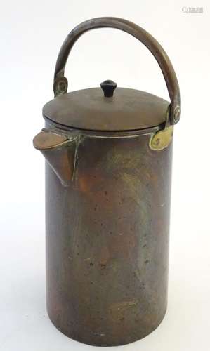 Kitchenalia: an early-20thC copper dairy can, with hinged spout and swing handles, 12