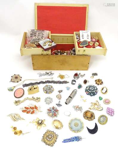 A quantity of assorted jewellery to include brooches, earrings, rings, necklaces etc. and a