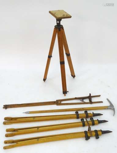 An 'Ensign' artist's folding portable easel, together with three tripods, a further folding tripod