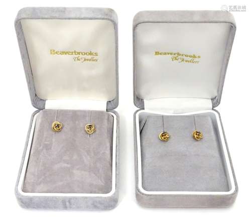 Two pairs of 9ct gold stud earrings Please Note - we do not make reference to the condition of