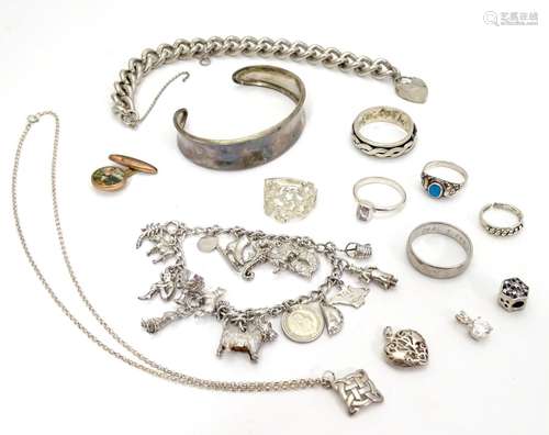 Assorted jewellery to include silver bangle bracket silver charm bracelet with various charms etc