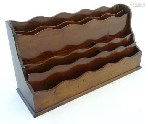 A 19thC mahogany waterfall letter / stationary rack comprising eight sections. Approx. 8'' high x