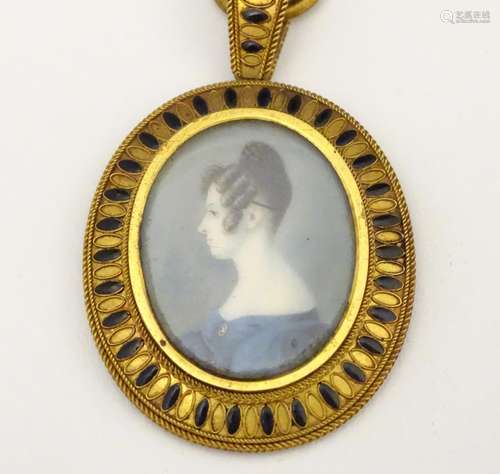 A 19thC English School watercolour and bodycolour oval portrait miniature set within a gilt metal