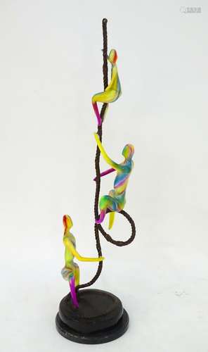 A bronze and coloured enamel sculpture of three acrobats on a rope. Approx. 41? high overall, the